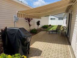 Modern charm meets vibrant living with outdoor oasis and golf cart fun!