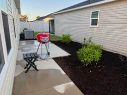 Stylish home with gourmet kitchen, dual garages, and private golf cart!