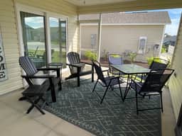 Stylish home with gourmet kitchen, dual garages, and private golf cart!