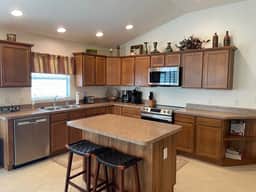 Spectacular Home with a Gas Golf Cart & Located just off Lake Sumter Landing!