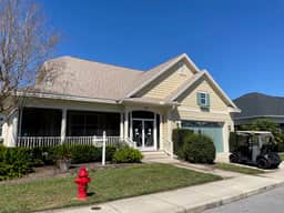 Charming cottage w/a wrap-around porch & golf cart—perfect for relaxation!