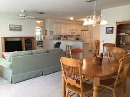 Patio Villa in St. Charles Village, GOLF CART, BBQ & WiFi included!