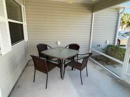 Charming Retreat with Lanai, Patio & Prime Location Near Town Squares!