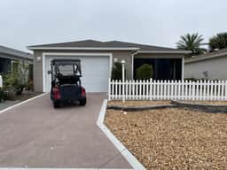 Stylish Home in Duval w/Granite, Tile Floors, Glass Lanai & Gas Golf Cart!