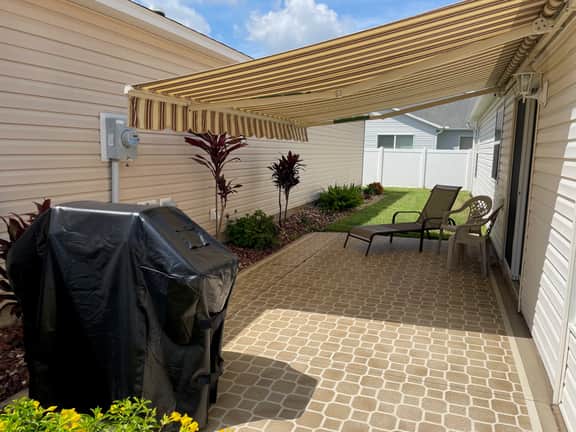 Modern charm meets vibrant living with outdoor oasis and golf cart fun!