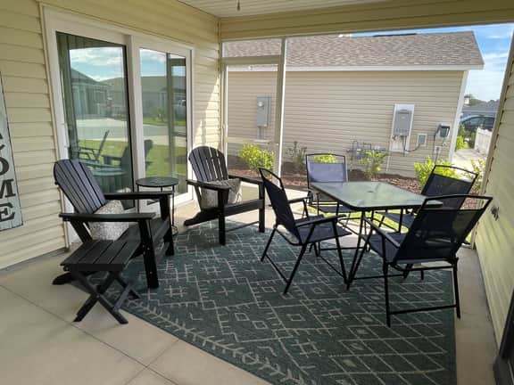 Stylish home with gourmet kitchen, dual garages, and private golf cart!