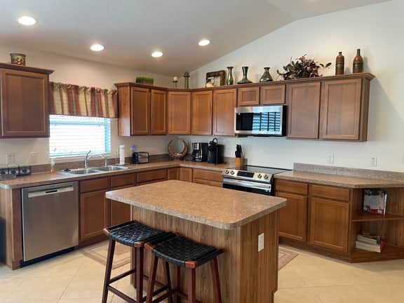 Spectacular Home with a Gas Golf Cart & Located just off Lake Sumter Landing!