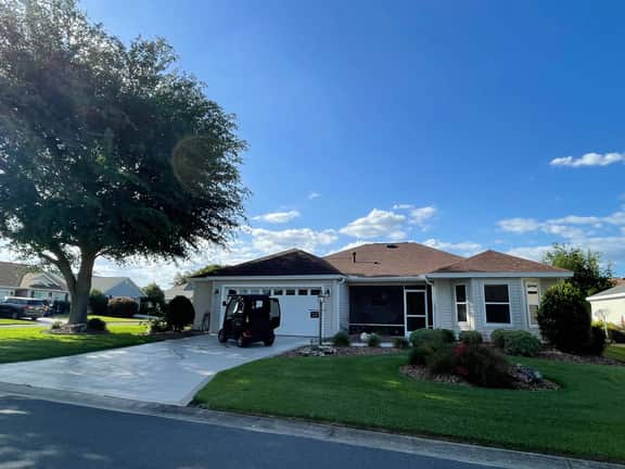Modern elegance meets Florida charm in this stunning home with golf cart!