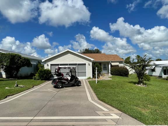 Sunlit retreat overlooking championship fairways—your Florida oasis awaits!