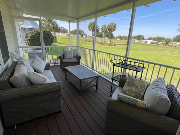 Sunlit retreat overlooking championship fairways—your Florida oasis awaits!