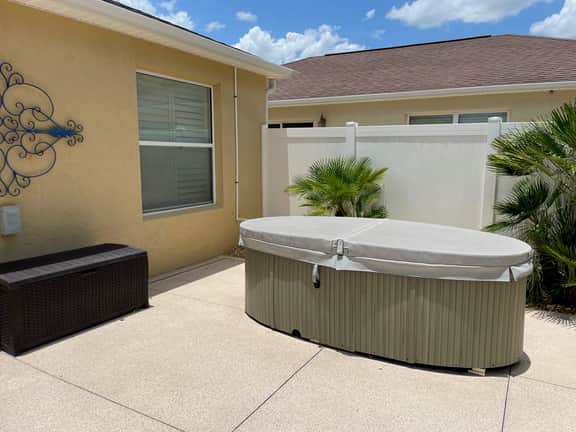 REDUCED RATE FOR JANUARY with granite finishes, hot tub, & golf cart included