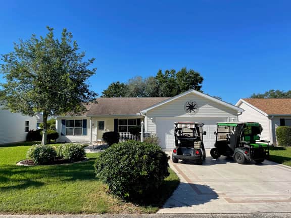 Cozy home w/golf cart, lanai, smart TVs, & prime location near town squares!