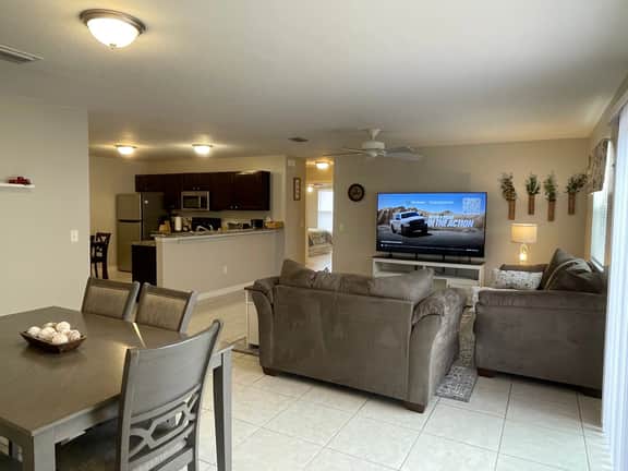 Stylish Home in Duval w/Granite, Tile Floors, Glass Lanai & Gas Golf Cart!
